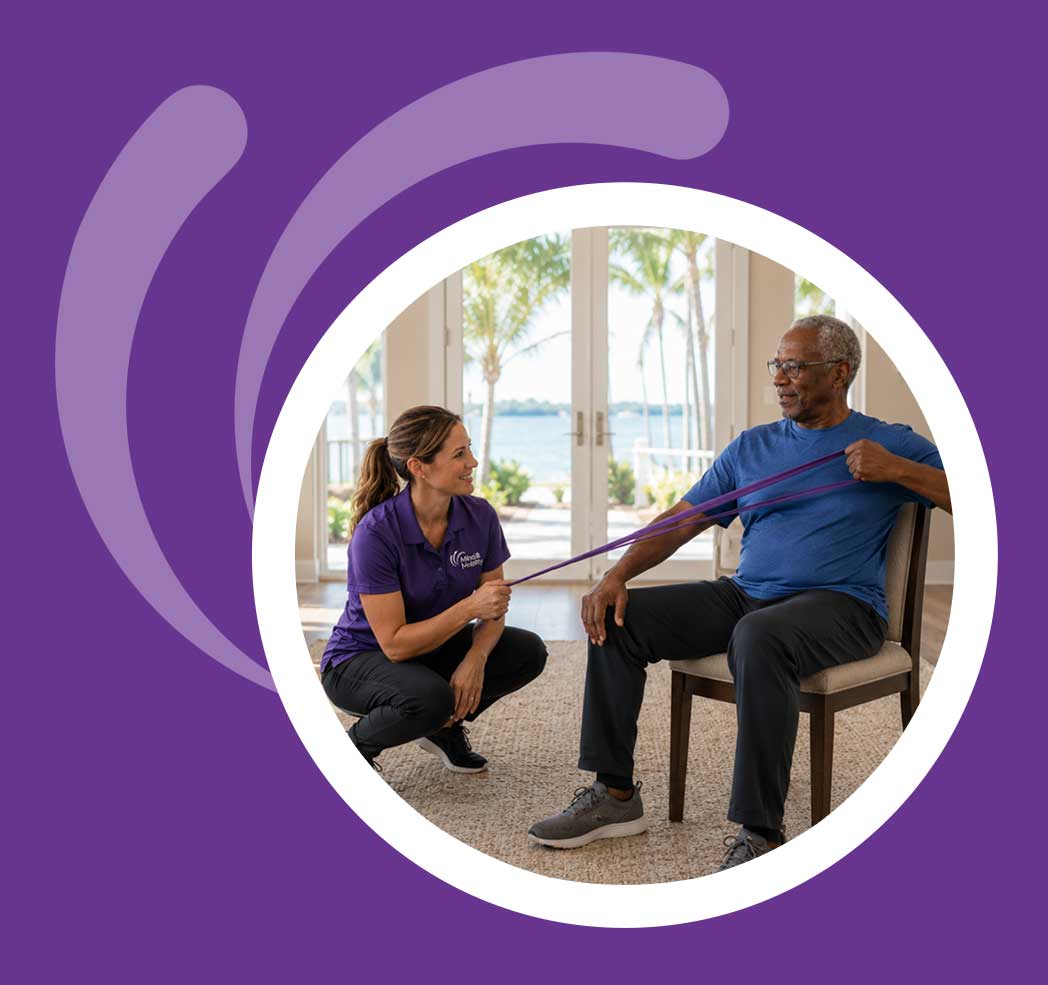 Physical therapist guiding an older Black adult through a shoulder exercise with resistance tubing at home